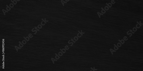 Dark charcoal grunge wall texture background. Dark black rough grunge surface with smoke edge. Black texture chalk board and black board.