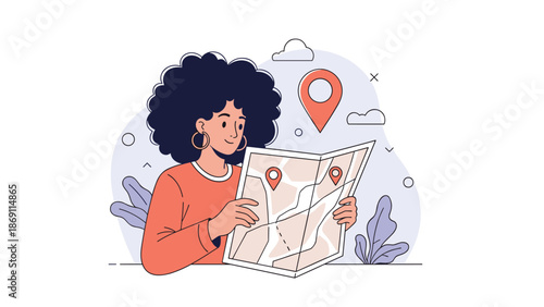 Woman with afro hair looking at a paper map with location pins