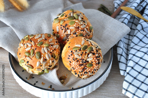 Close up Fresh Homemade Multiseed Bun on Dish
