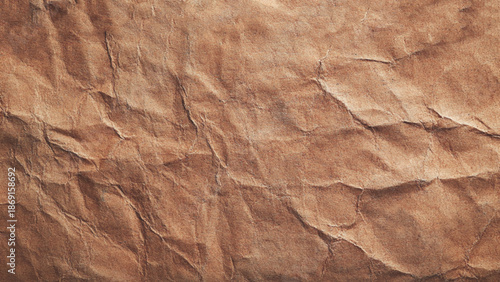 Wrinkled craft paper. Torn kraft paper texture background. Old craft vintage cardboard isolated on black. Recycled material concept