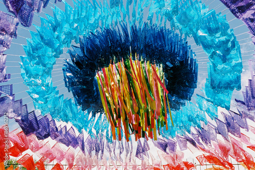 Film photo of a colorful explosion of papel picado from above