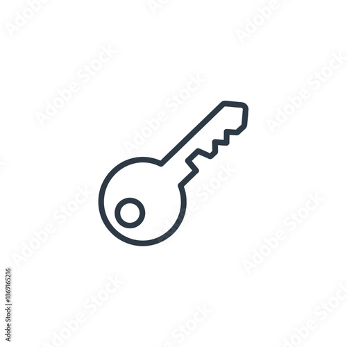 Close-up of a Metal Key Isolated on a Plain Background for Security and Access