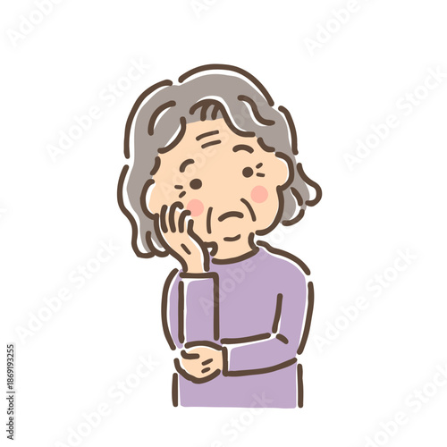 首をかしげて考え事をしている高齢女性／単品