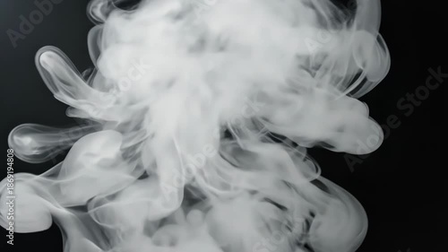 White Smoke Rising Against Black Background.