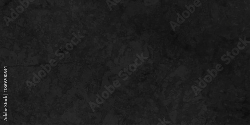 Dark black grunge wall charcoal color texture backdrop background. concrete wall rough decoration smooth plaster stone texture.