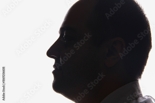 Wallpaper Mural Portrait of a middle-aged Iranian man in a white background with studio lighting Torontodigital.ca