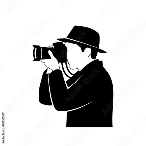 Silhouette of a Detective Photographer in a Hat Taking Pictures with a Camera
