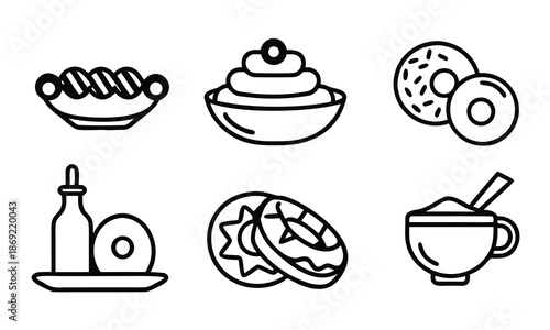 A set of black and white icons depicting various breakfast foods and drinks