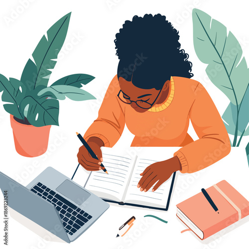 A young woman writing in a notebook surrounded by plants and a laptop