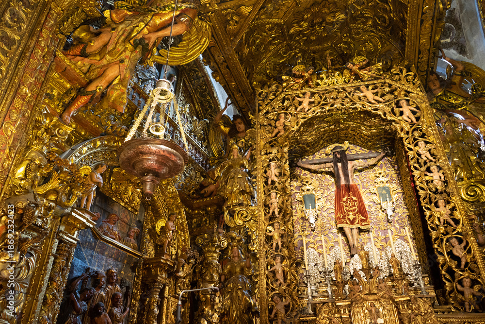 Fototapeta premium Intricate golden altar with religious figures.. Orense Cathedral, Spain