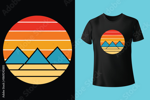 Dynamic black and white t shirt design featuring a snowboarder mid air against a mountain and forest landscape