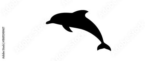 Black silhouette of a swimming dolphin, isolated on white background. Minimal marine animal illustration representing ocean life, freedom, nature, and aquatic movement.
