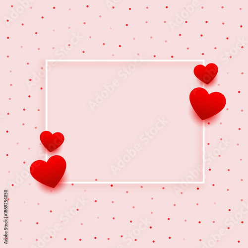 Valentine's Day Background with Red Hearts and White Frame on Pink Polka Dot Pattern with Copy Space