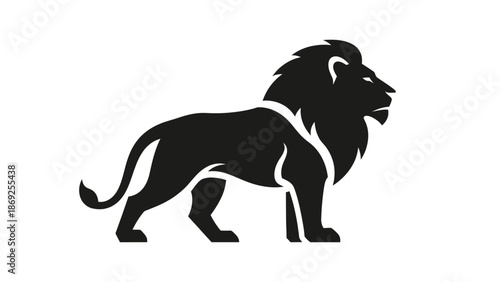 A majestic black silhouette of a lion standing proudly, showcasing its powerful and regal form against a white background.
