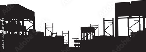 Industrial silhouette of construction site at sunset