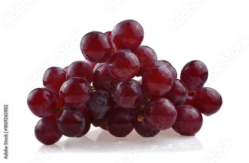 Bunch of red grapes with water drops isolated on white background