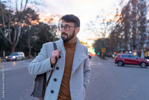 Young man commuting in city with urban lifestyle