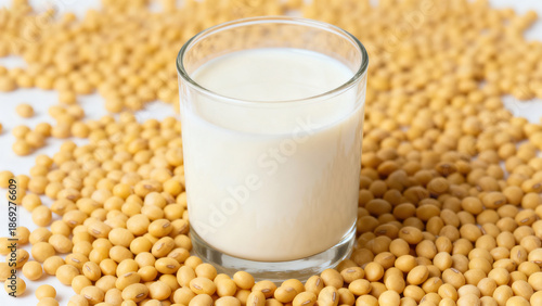 Fresh Still Life: Milk in a Glass Cup and Scattered Soybeans