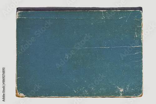 Hardcover book on white background. Worn teal book cover with vintage paper texture, scratches. Aged retro style, academic nostalgia minimalist background, copy space