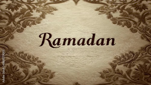 Ornate floral border surrounds elegant scripted text 'Ramadan Kareem' on textured, aged paper