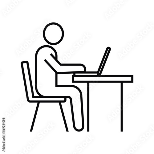 Person working on laptop at desk, office workspace