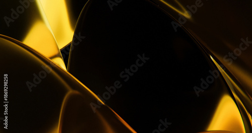 Reflective golden light on a dark surface