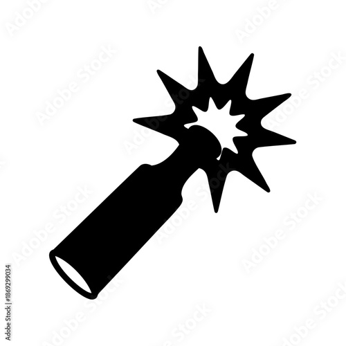 A vintage cowboy spur in striking silhouette on a plain white background