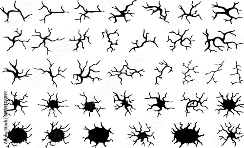 A diverse collection of various black crack and fracture patterns displayed on a pristine white background