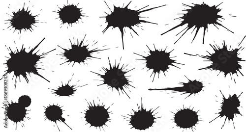 A large collection of various black ink blots and paint splatters on a clean white background