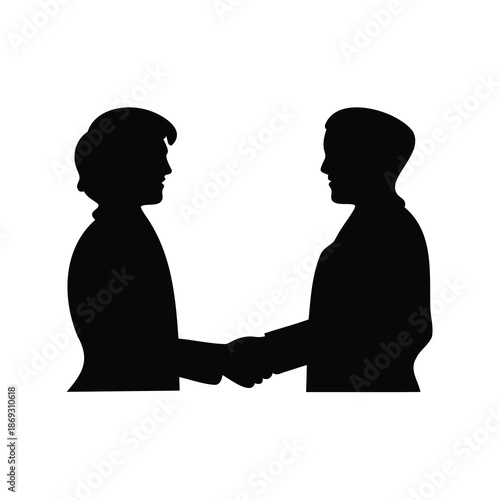 Silhouette of two people shaking hands demonstrating business communication and agreement