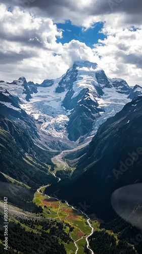 Aerial View of Swiss Alps With Glaciers and Valleys, Sunny Day