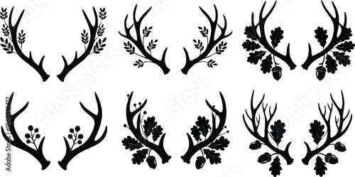Black silhouette antlers decorated with leaves acorns and berries eight pairs of rustic nature inspired flat design isolated on white background
