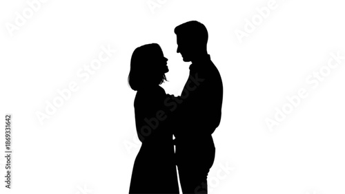A romantic silhouette of a loving couple embracing against a clean white background