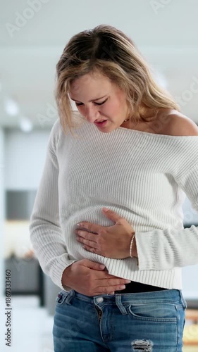 Young Sick Woman With Stomach Pain