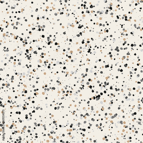 Classic cream terrazzo texture with dense neutral stone fragments