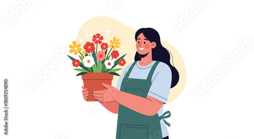 Happy young woman wearing a green apron holding a large terracotta pot filled with vibrant blooming flowers against a warm background.