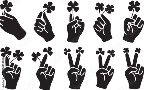 Black Silhouette Hands Holding Four Leaf Clovers and Three Leaf Clovers shamrock