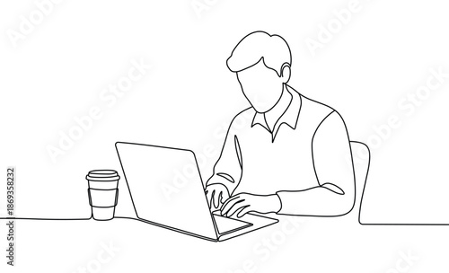 Male professional typing laptop computer at desk with coffee cup productive workflow diligent work