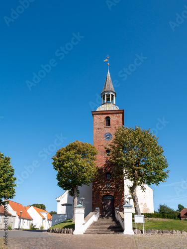 Entrance and tower of Ebeltoft Church in old town Ebeltoft, Jutland, Denmark