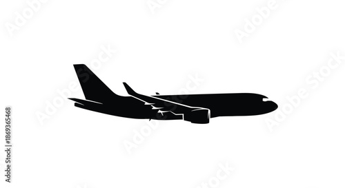 A dark airplane in flight a striking black shape silhouette
