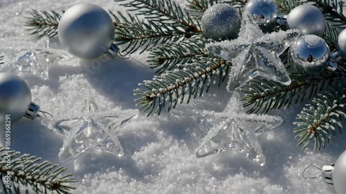 Decorating with winter evergreens and ornaments in fresh snow