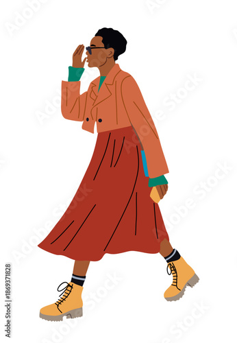 Stylized minimalist illustration of a fashionable African American woman in motion walking side view wearing a trench coat and platform boots. Vector isolated on transparent background