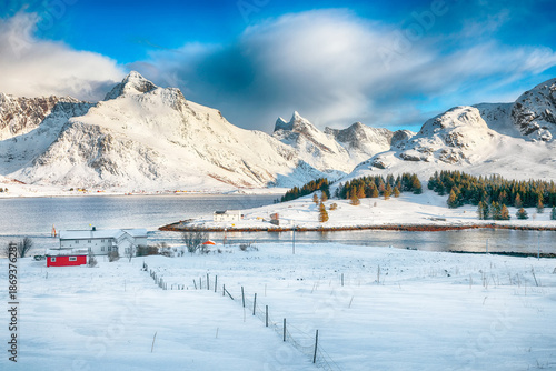 Wallpaper Mural Amazing  winter view on Selfjorden with small fishing houses (rorbu) and snowy peaks on background. Torontodigital.ca