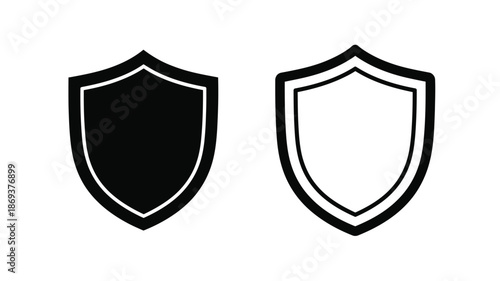 Two shield icons one filled black and one with a white interior