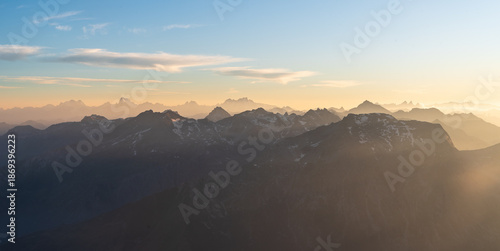 View from Rocciamelone mountain peak in Graian Alps in Italy near borders with France