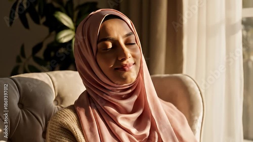 Wallpaper Mural Portrait of a Woman Wearing a Pink Hijab Indoors. Torontodigital.ca