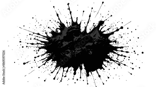 A black ink splatter with many small droplets radiating outwards on a white background, creating an abstract and dynamic visual effect.