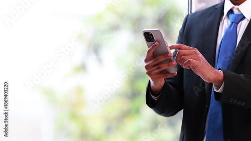 businessman with mobile phone with copy-space