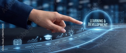 Learning & Development: Businessman pushes virtual button, skills, knowledge, and employee training on futuristic interface.