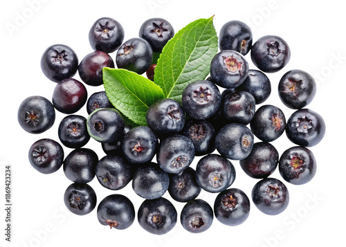 Pile of fresh ripe blueberries with green leaves, healthy food